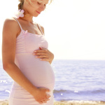 pregnant woman on the beach